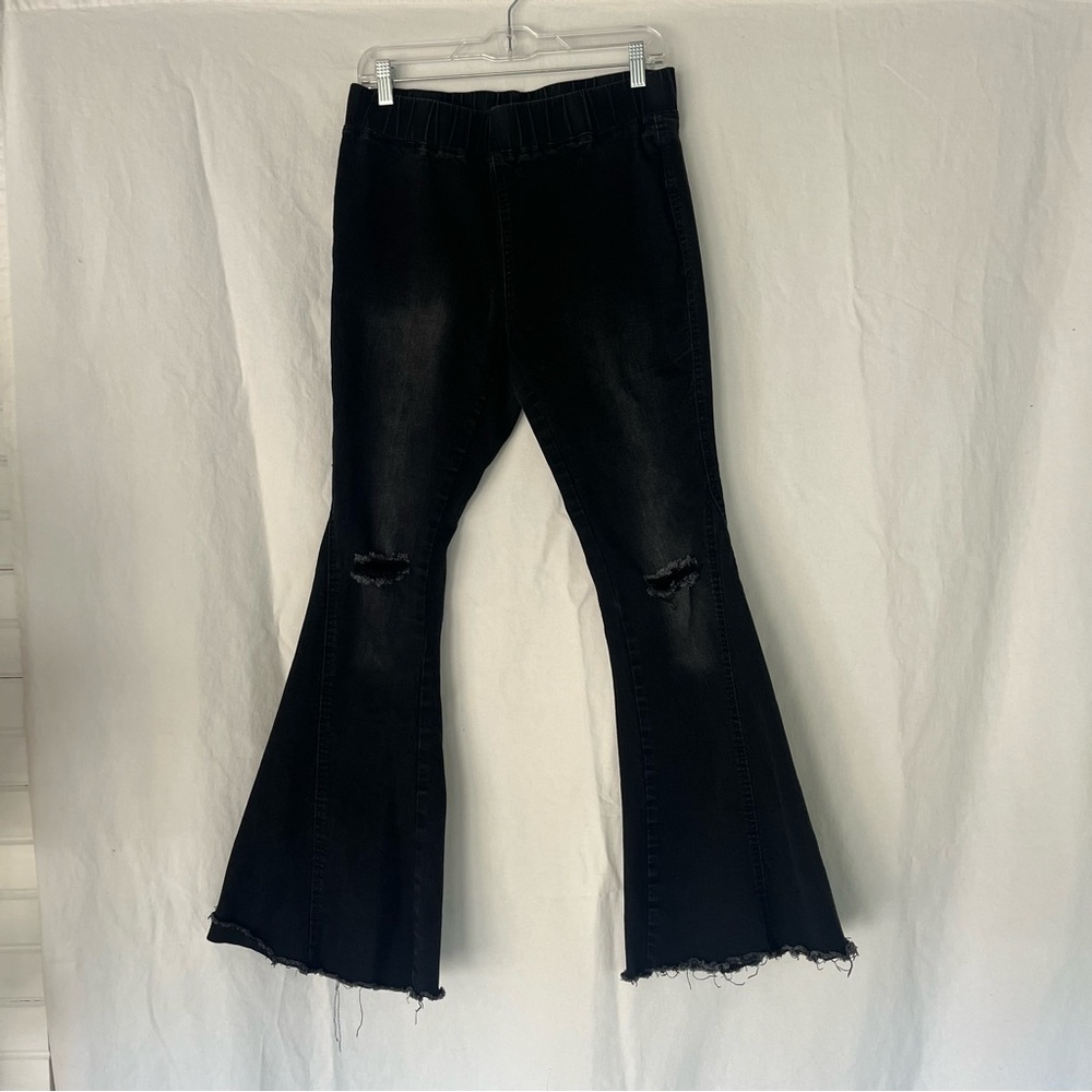 Super slimming Black Wash Flare Raw Hem Distressed Pants